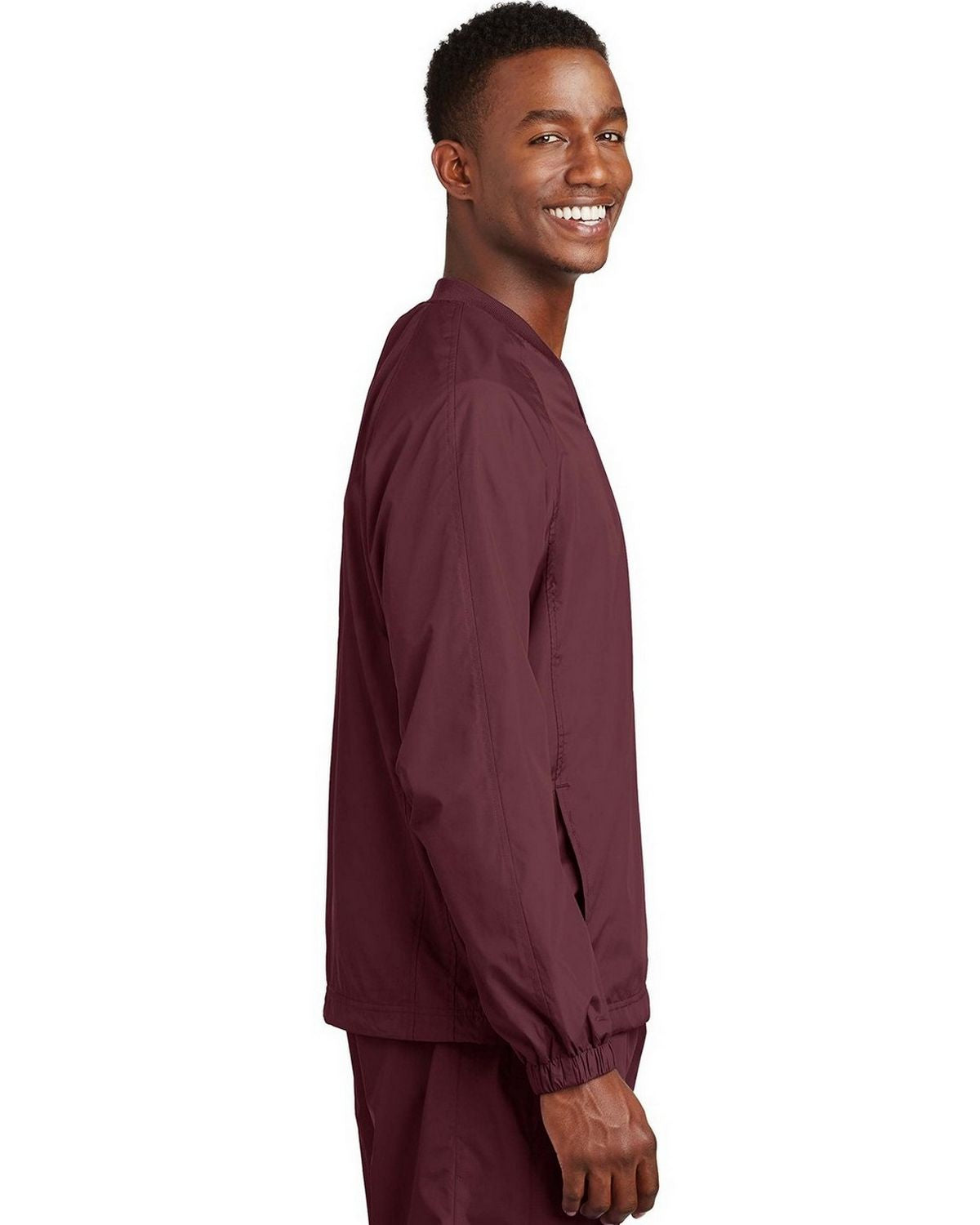 Sport-Tek V-Neck Raglan Wind Shirt. JST72